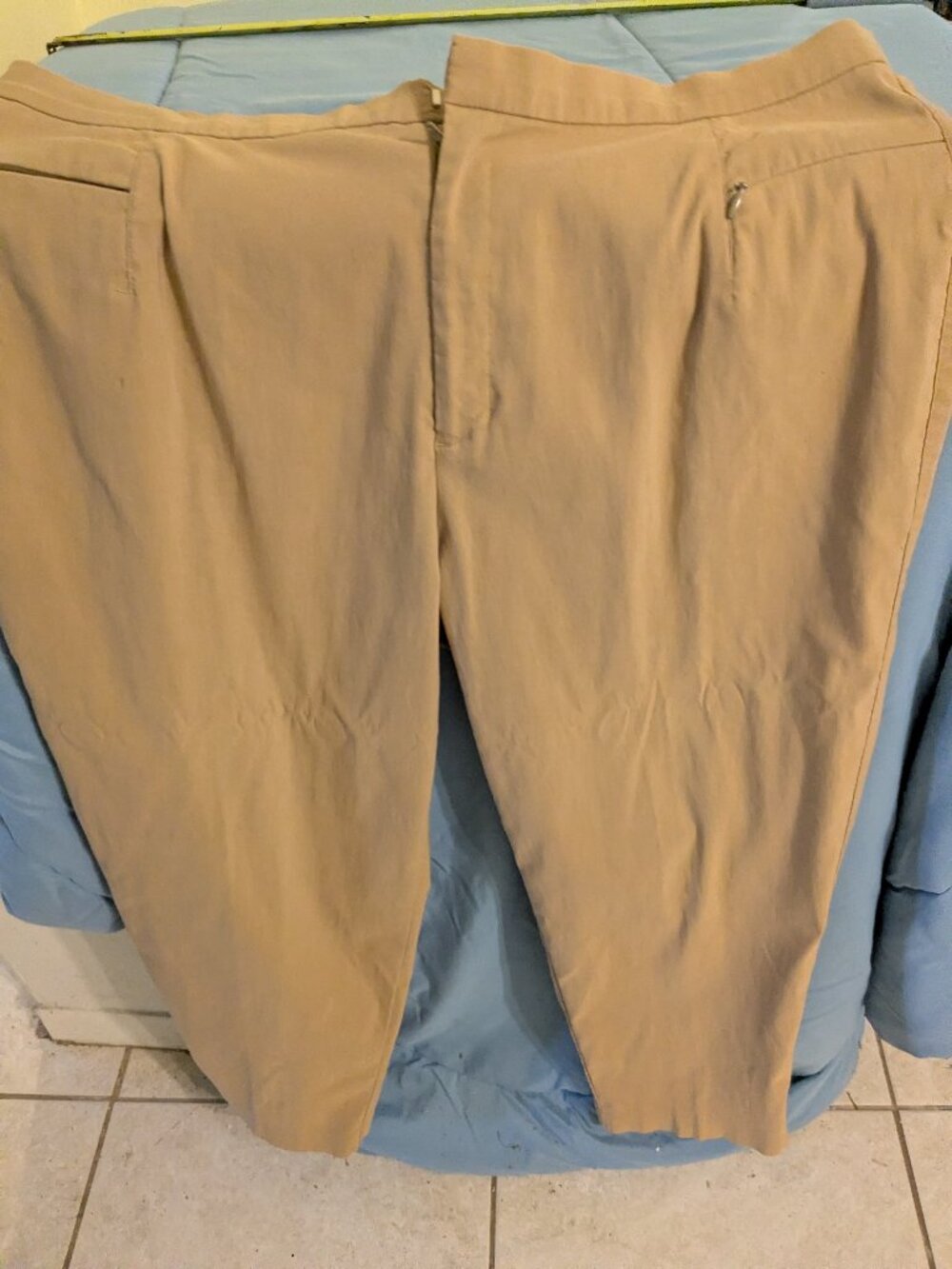 Nice khaki pants - nicer than jean material. Side zipper..